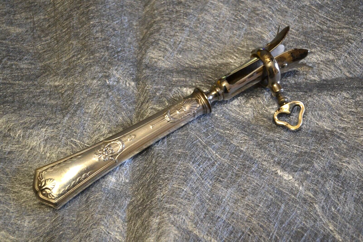 pince à gigot, manche en argent fourré (PB : 133,94 gr