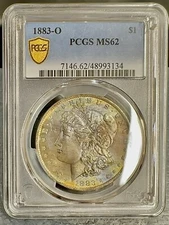 1883 O MORGAN SILVER DOLLAR PCGS MS62 GOLD SHEILD COLORFUL TONING