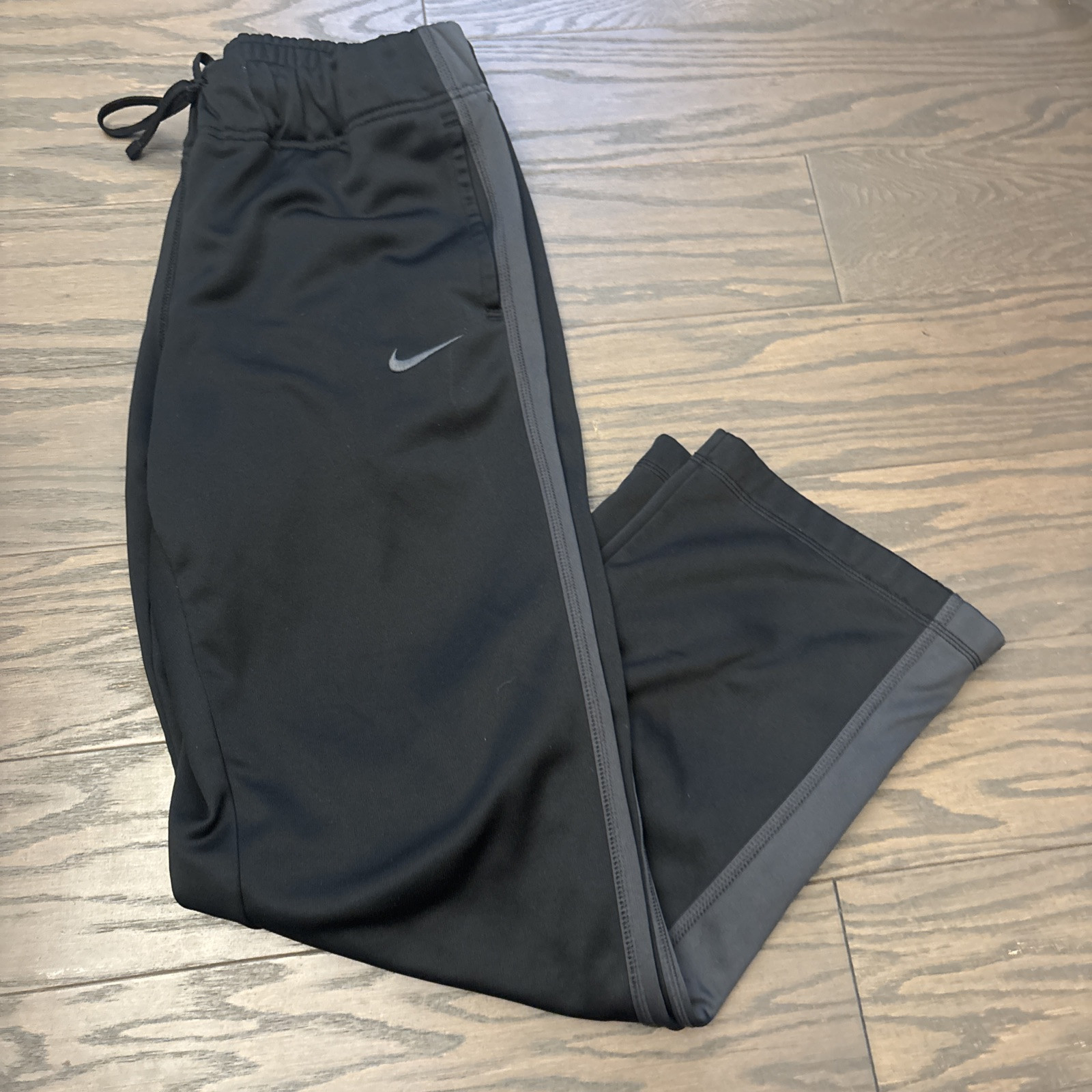 Nike Womens Therma Fit KO Fleece Lined Pants Pockets Black Ankle Zip Medium EUC