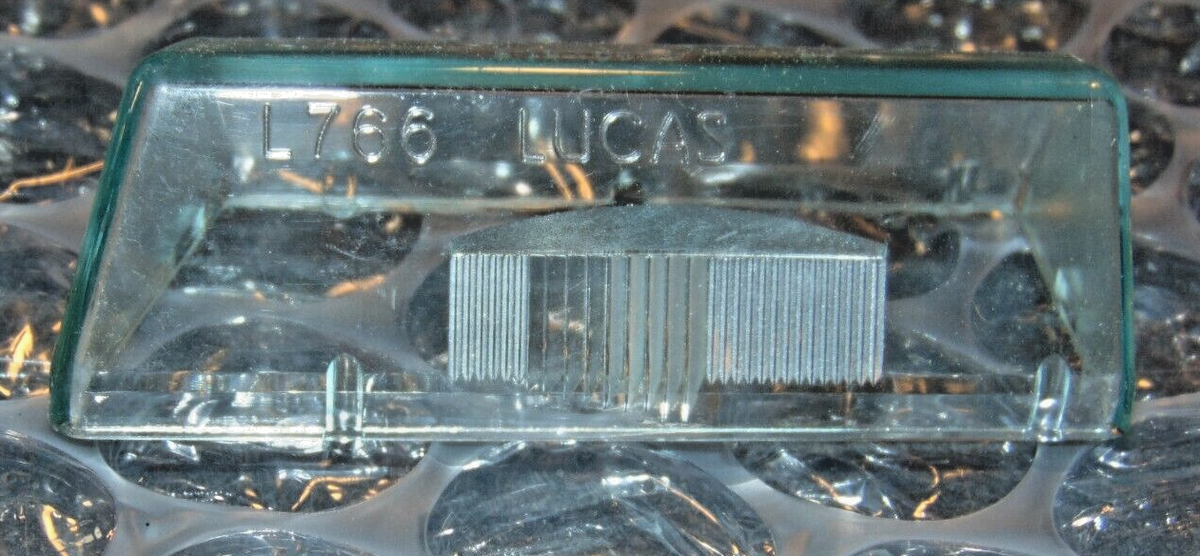 NOS Lucas License Plate Lens 54579265. Model 766. 1969-71 NOS Lucas License Plate Lens 54579265. Model 766. 1969-71