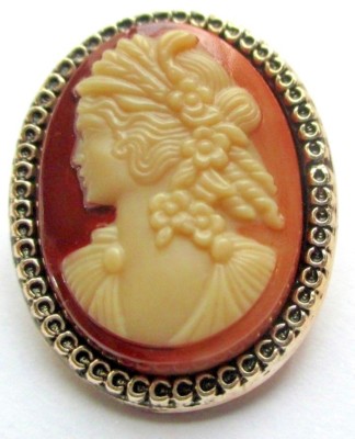 Camées / Néo-classique / Broche en or et camee en onyx. Buste dit de