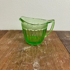 Jeanette Glass Co Depression Era Floral Pattern green vaseline uranium creamer