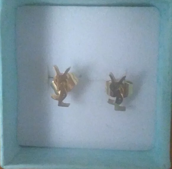 Pendientes mujer color oro acero marca Yves Saint Lauren
