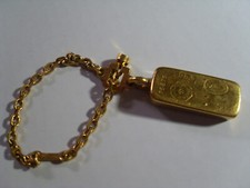 mini "lingot d'or"-porte clé et chaine en bronze doré à l'or fin-TBE