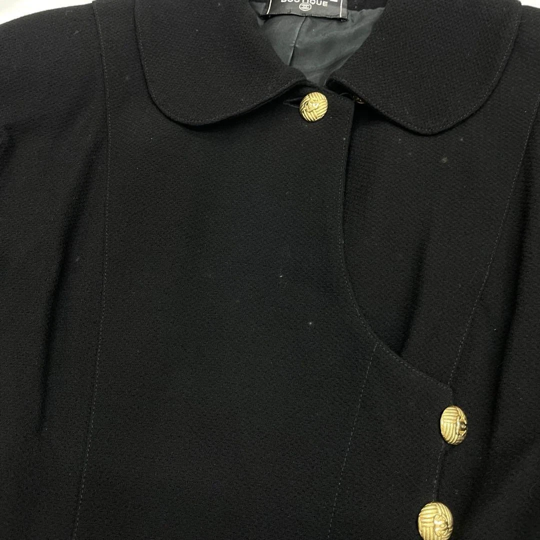 Cappotto modello popolare Chanel intrecciato con bottoni cocco