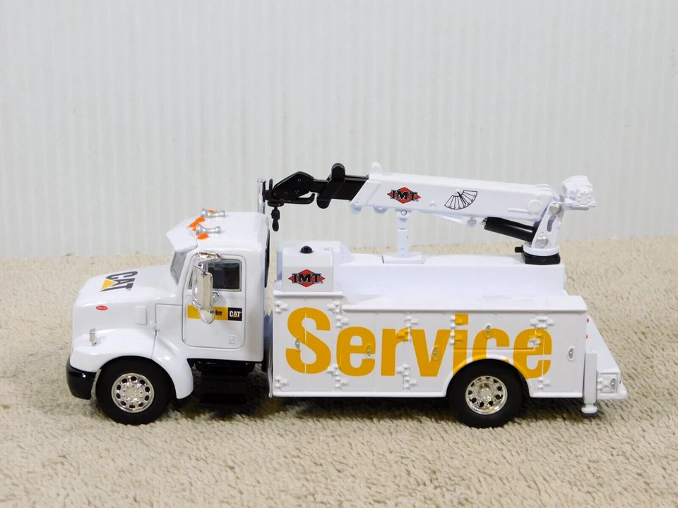 Caminhão de serviço Norscot 55118 escala 1:50 Peterbilt modelo 330 revendedor CAT - Imagem 4 de 4