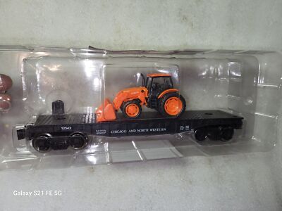 New Menards CNW Flatcar With Kubota Tractor 027 Scale 279-3186