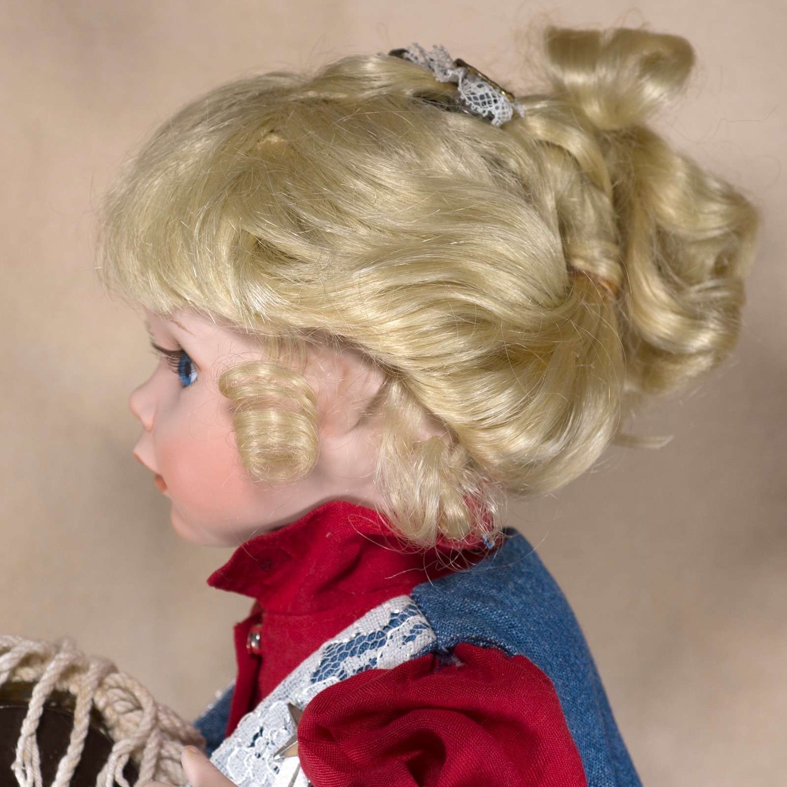 porcelain doll in wooden box