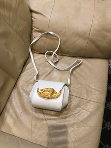 white alligator purse