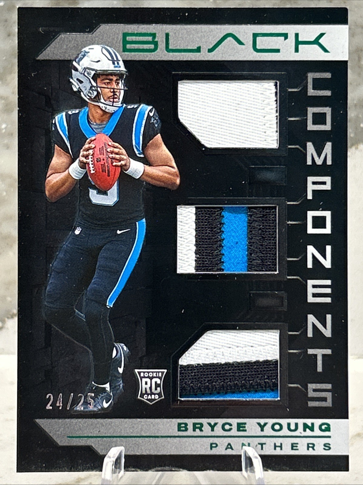 2023 Panini Black Bryce Young RC Components #COM-2 Emerald /25 MEM Best Patches