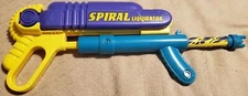 Spiral Liquidator Squirt Gun Purple, Blue And Yellow Works
