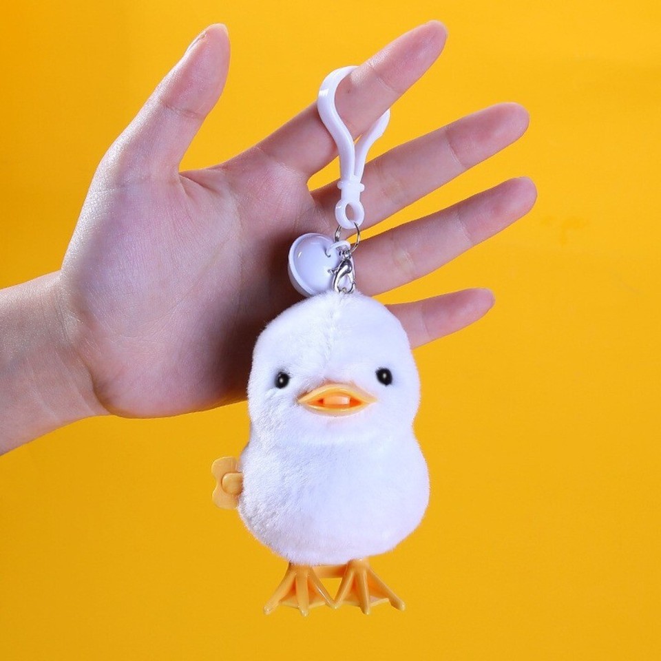 Simulation Clockwork Spring Rabbit Toy With Keychain Bell Jumping Toy ...