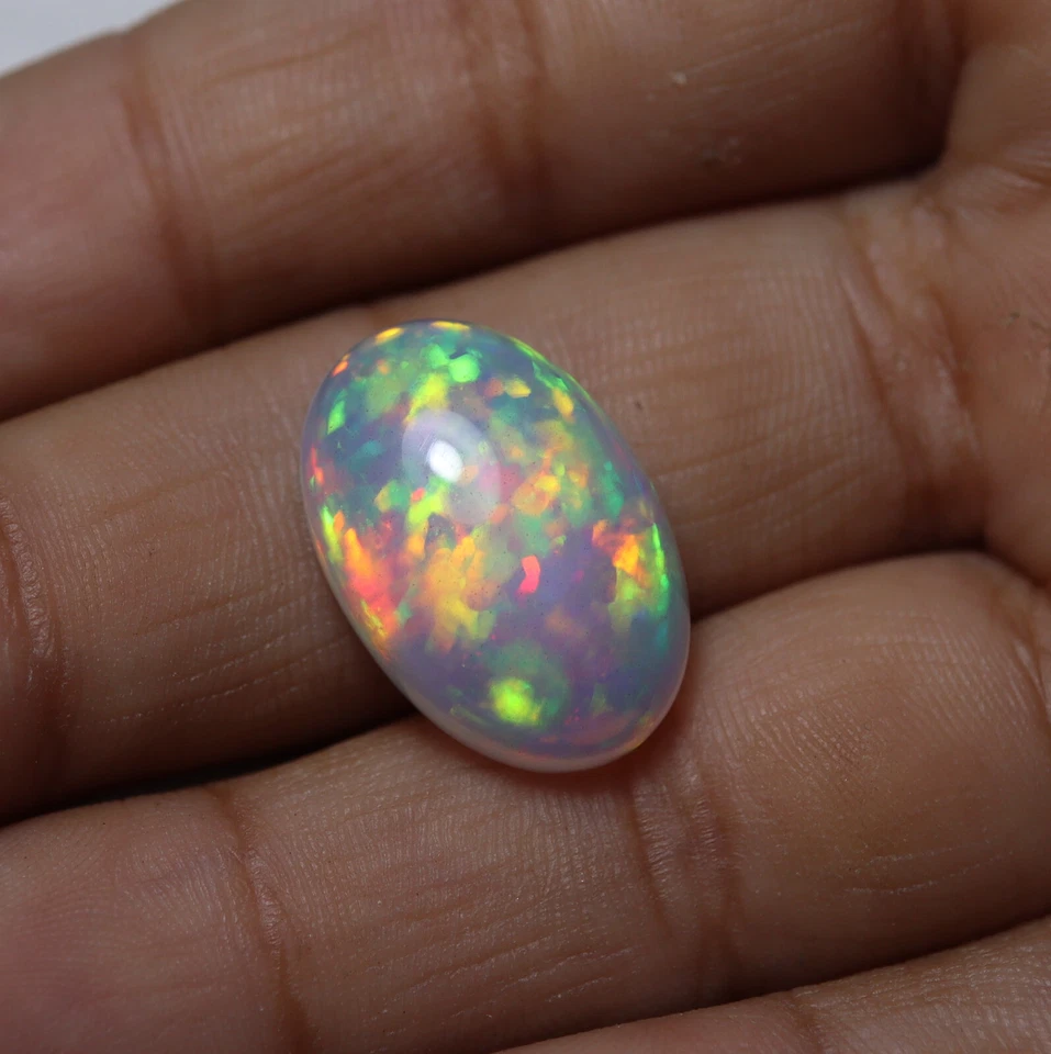 9,1 quilates 18,3 x 12,3 mm natural AAA llamativo multi fuego ópalo etíope cabujón ovalado Foto 3 de 4