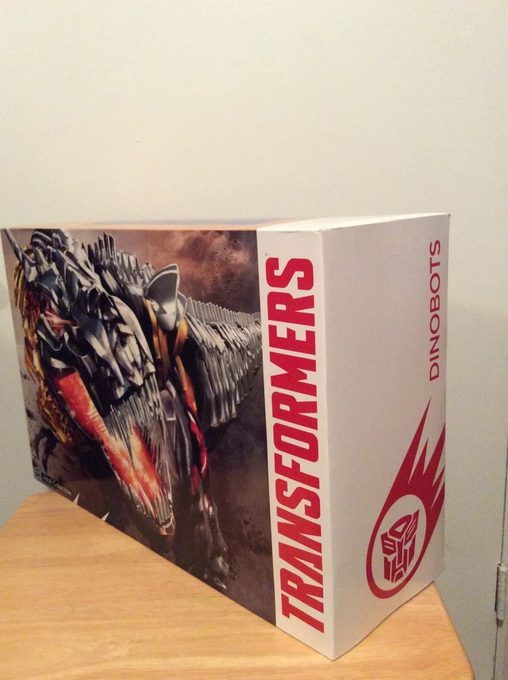 Sdcc 2014 Esclusivo Transformers Dinobots Non Aperto Sigillato Hasbro - Immagine 3 di 4