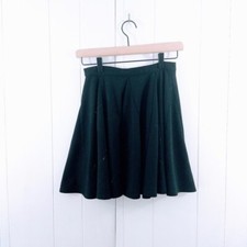Black vintage full circle skirt. Hits about mid thigh if worn high waisted. ...