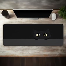A Large Gaming Mouse Pad Featuring a Cute Black Cat Design on a Black Backgrou