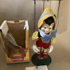 1990s Disney Christmas Telco Motion-ette Pinocchio Singing Animated in Box