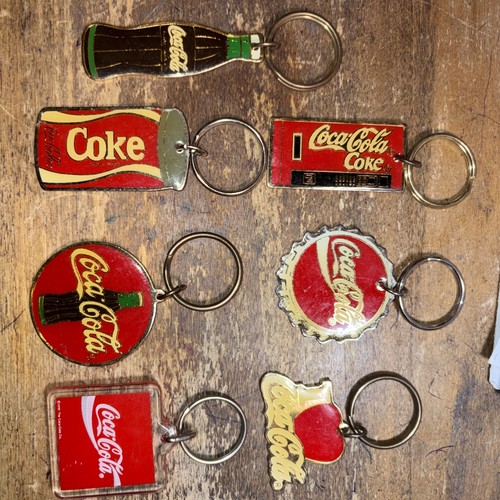 LOT OF 7 Vintage COCA-COLA METAL KEYCHAINS - All Different