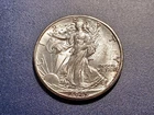 Very Choice BU 1945-D Walking Liberty Half Dollar (lightly toned)