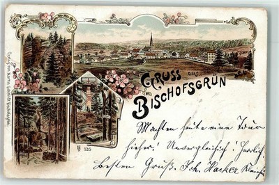 13448125 - 8583 Bischofsgruen Kirche Turm Felsen Wald Blumen Gruss Lithographie