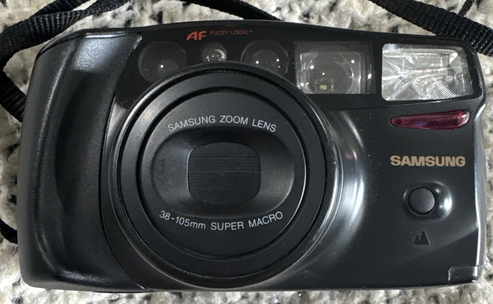 Cámara fotográfica compacta Samsung Máxima Zoom 105 35 mm - negra sin probar. Foto 2 de 4