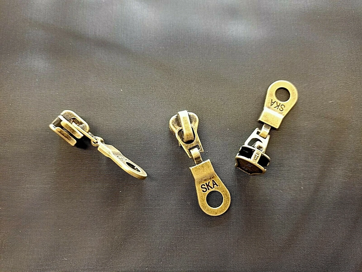 Cursori - Cerniere ed Accessori - Materiali per la Produzione - Collini