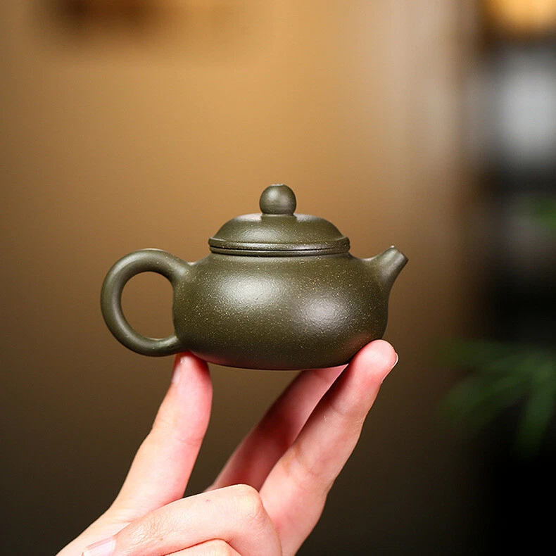 Olla pequeña de 70 ml marcada con 7 orificios infusores olla maestra hecha a mano Yixing Zisha arcilla verde Foto 2 de 4