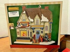 LEMAX Chocolate Swirl Lighted Building #25409  2012   Perfect Personal Gift!