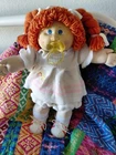 Vintage 1985 Cabbage Patch Kid, Red Braids, Blue Eyes, Rosy Cheeks. UT tag, HM4.