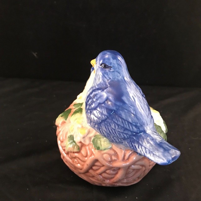 Decorative Ceramic Blue Birds Sitting On A Nest Possibly A Bird House
