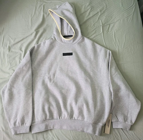 Felpa con cappuccio Fear Of God Essentials con bordo grigio erica chiaro PICCOLA