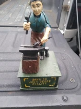 BANK ON JOHN DEERE QUALITY Cast Iron Mechanical Blacksmith w/ Anvil Coin Bank