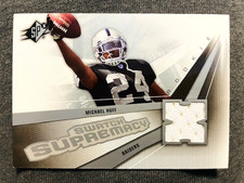 2006 Upper Deck SPX Michael Huff Rookie RC Swatch Supremacy Jersey Relic Card. rookie card picture