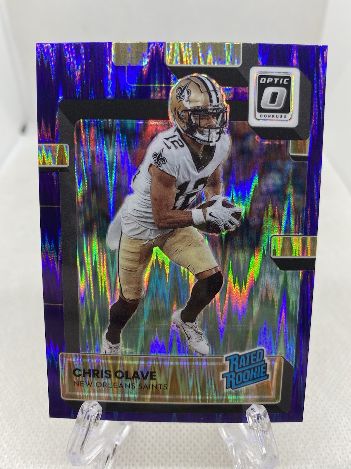 2022 Donruss Optic - Rated Rookie Chris Olave #209 Purple Shock Prizm (RC)