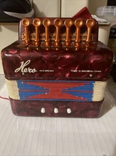 Vtg Red Celluloid? Child's working Accordion Hero Brand