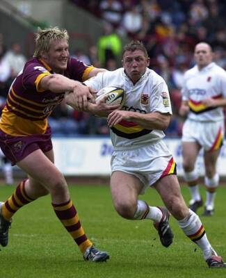 Bradford Bulls' Mike Forshaw tries to evade Eorl Crabtree of Hudd - Old Photo