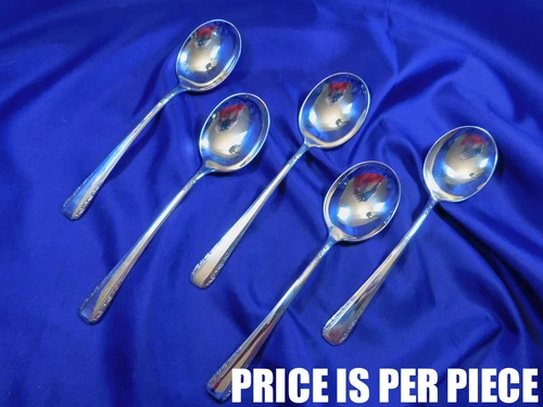 INTERNATIONAL COURTSHIP STERLING SILVER CREAM SOUP SPOON - EXCELLENT CONDITION