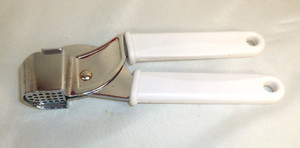 Garlic Press Hand Held Stainless Steel White Plastic Handle Easy to use