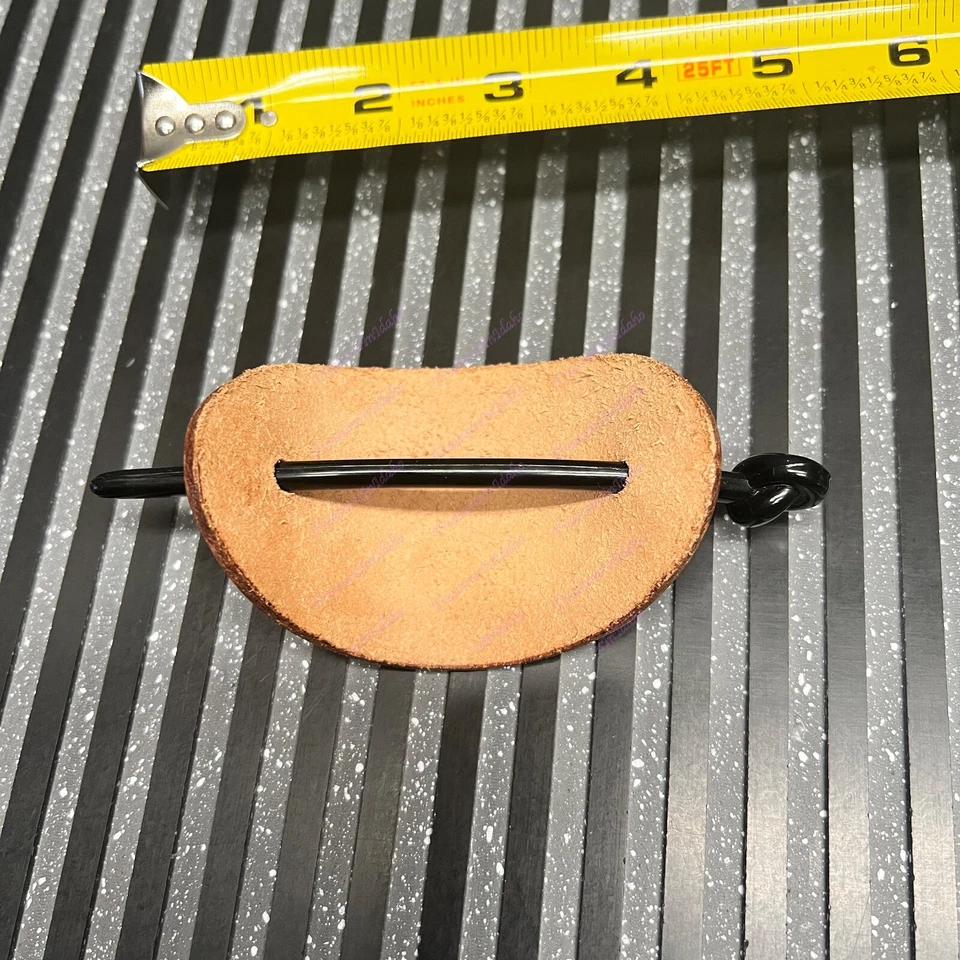 Bareta de pelo mariposa de cuero hecha a mano. mecanizado a mano Foto 2 de 2