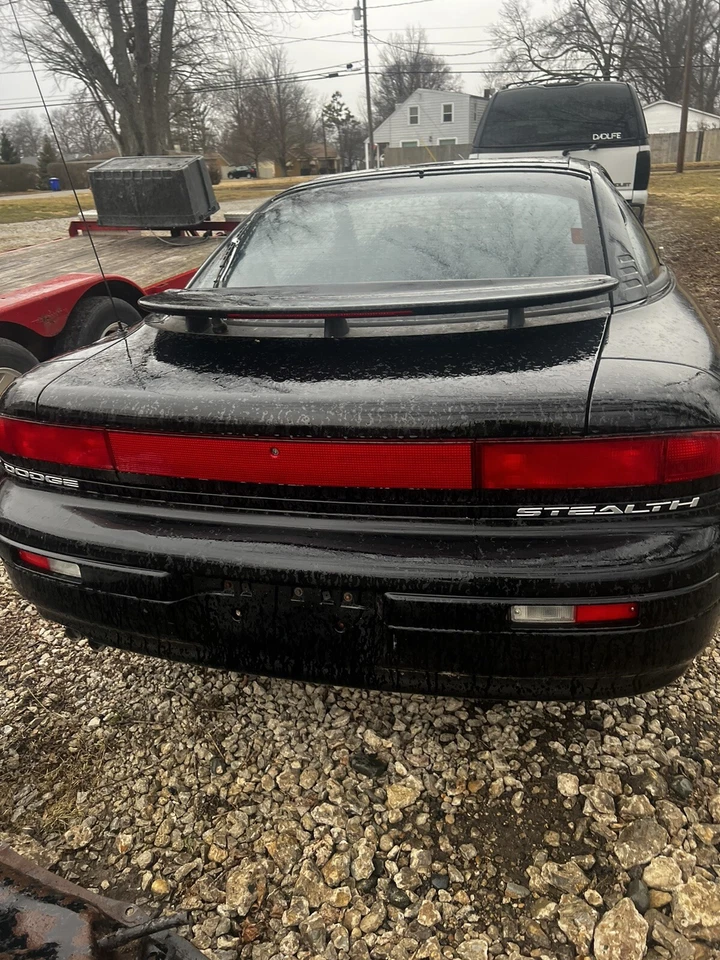 Panel de acabado de lámpara de luz trasera central Dodge Stealth 91-95 OEM usado Foto 2 de 4