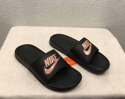 black and rose gold nike slides