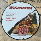 VINTAGE 1955 WINCHESTER MODEL 88 HUNTING RIFLE 12 INCH PORCELAIN ENAMEL SIGN