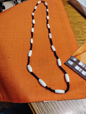 Natural bead maybe bone unsure and small black beads looks wood necklace