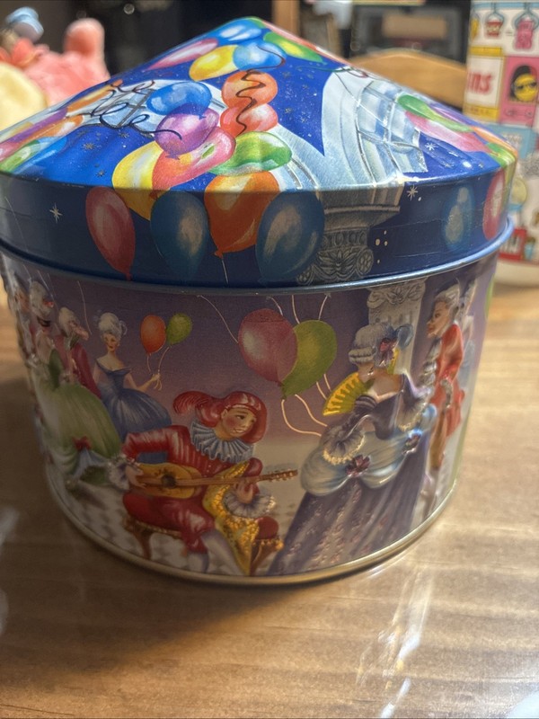 vintage embossed "Masked Ball" candy tin By Churchills Confectionery 