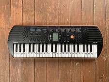 Casio SA-76 Electronic Keyboard, Beautiful orange, black color 100 Tones. Drums