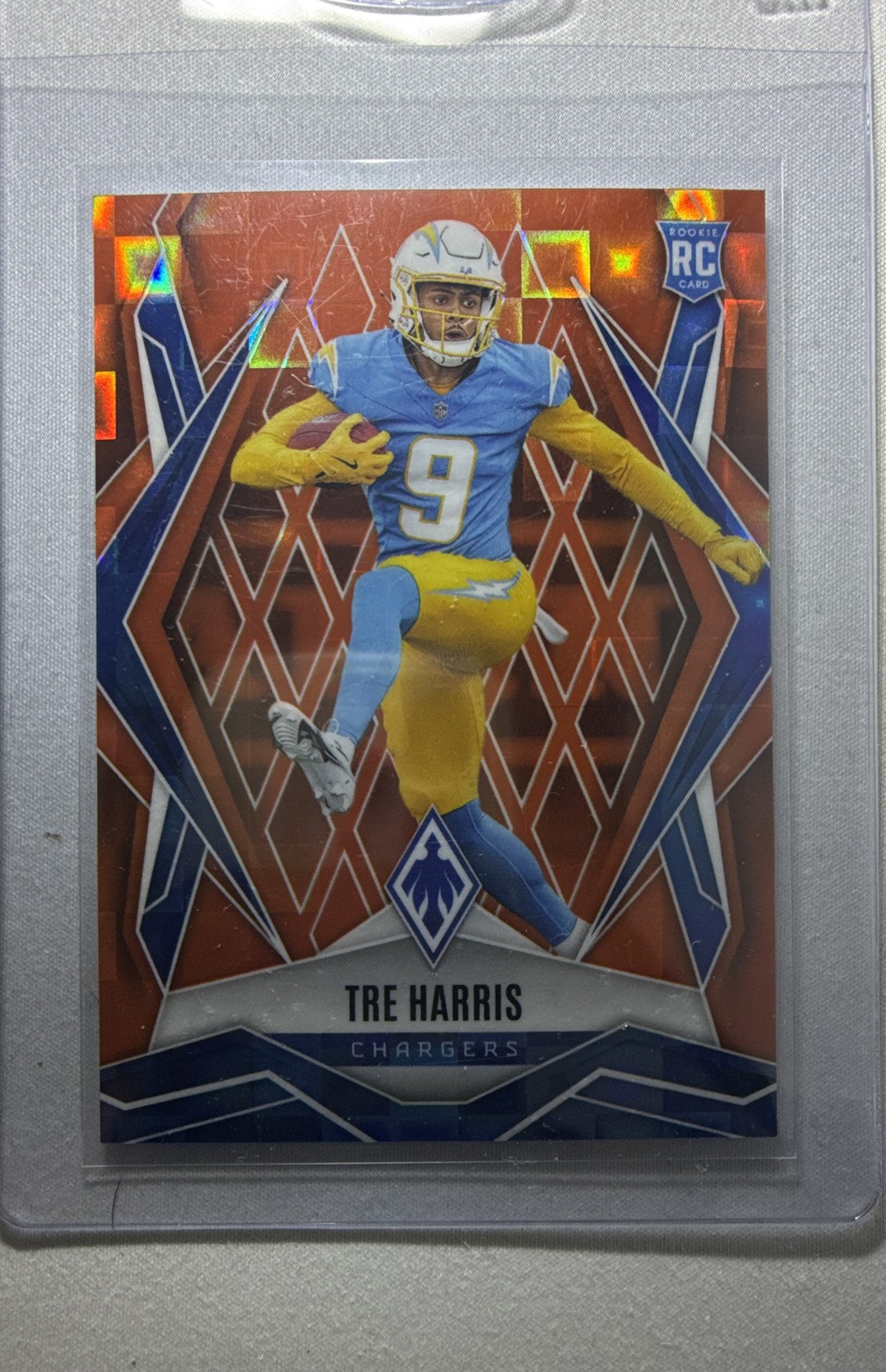 2025 Panini Phoenix - Rookies Tre Harris #160 Orange Pandora /189 (RC)