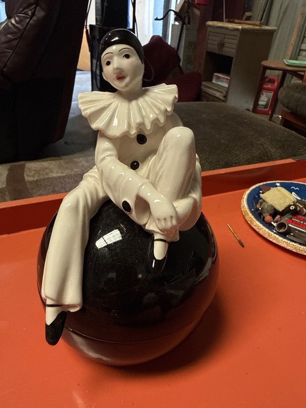 Beautiful Harlequin Porcelain Sitting on Black Sphere. Vintage and Beautiful