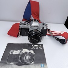 Vtg Canon AT-1 35mm SLR film camera kit W/Lens Speedlite Flash Kit