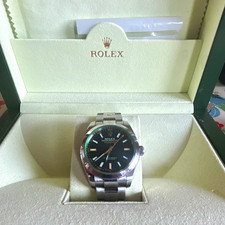 Rolex Milgauss 116400GV 40mm Auto Black Dial Green Crystal Steel Box