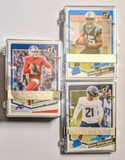 Lot of 70 NFL Cards [2023 Donruss] NM to NM-M 50 RCs w/ Plastic Cases